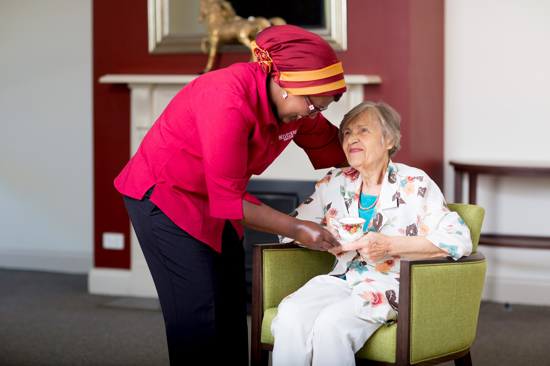 Melbourne aged care worker and client interacting