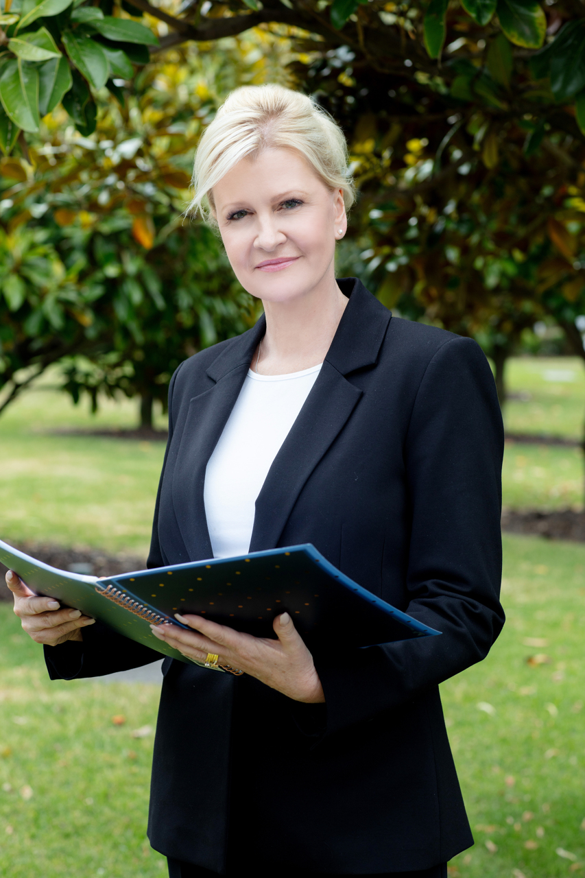 Professional portrait of a melbourne funeral celebrant outside