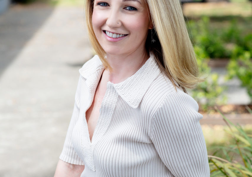 Relaxed outdoor personable professional portrait of a health coach