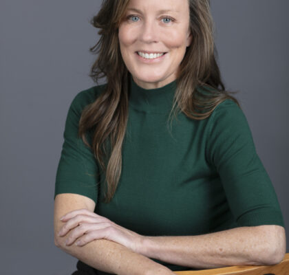 Seated relaxed Professional headshot of a finance broker in Melbourne