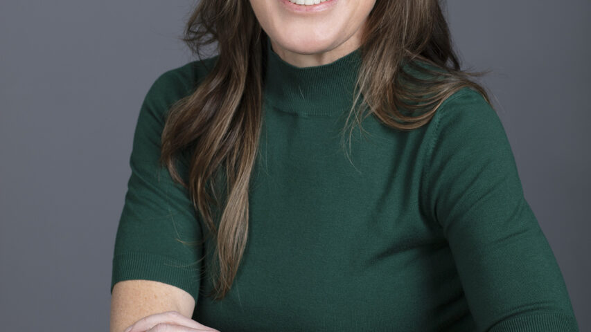 Seated relaxed Professional headshot of a finance broker in Melbourne