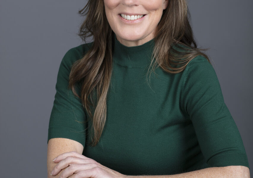 Seated relaxed Professional headshot of a finance broker in Melbourne