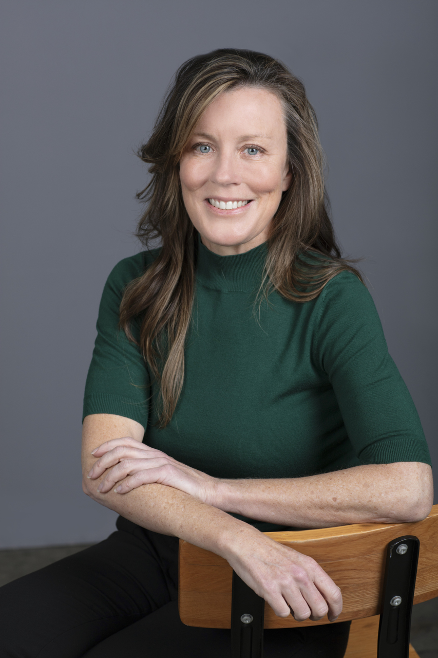 Seated relaxed Professional headshot of a finance broker in Melbourne